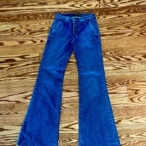 Just Black denim size 25 flare jeans. Needs one stitch on the back side.